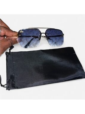 Lacoste Gold-Trim Rimless Sunglasses with Blue Gradient Lenses